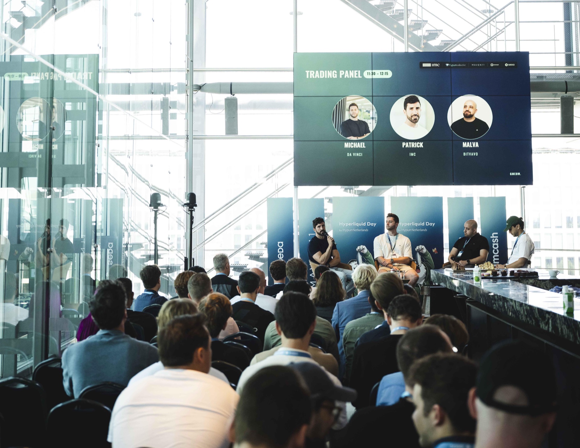 A packed room at Hyperliquid Day in Amsterdam during the Trading Panel